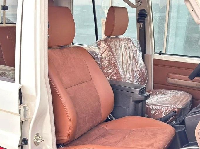 New Toyota Land Cruiser 70 Series Facelift 2, 4.0 l, 2025 in Abu Dhabi by Al Lulu Cars, White color. GCC Specs | AUTO.AE