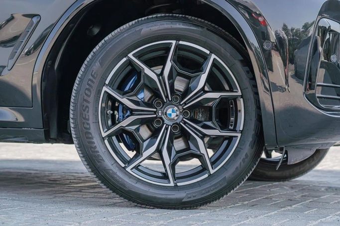 Подержанный BMW X4 M Competition I (F98) Рестайлинг, 3.0 л, 2024 в Аджмане от AMG Cars Черный цвет. Американская | AUTO.AE