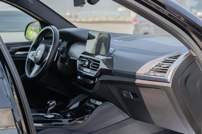 Подержанный BMW X4 M Competition I (F98) Рестайлинг, 3.0 л, 2024 в Аджмане от AMG Cars Черный цвет. Американская | AUTO.AE