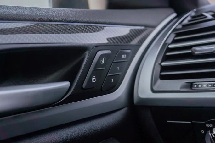 Подержанный BMW X4 M Competition I (F98) Рестайлинг, 3.0 л, 2024 в Аджмане от AMG Cars Черный цвет. Американская | AUTO.AE