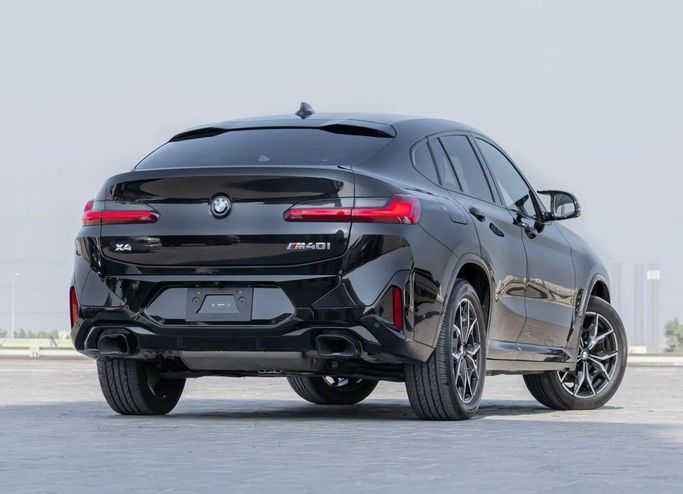 Подержанный BMW X4 M Competition I (F98) Рестайлинг, 3.0 л, 2024 в Аджмане от AMG Cars Черный цвет. Американская | AUTO.AE