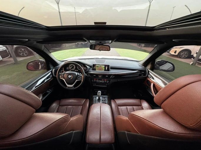 Подержанный BMW X5 50i III (F15), 4.4 л, 2014 в Аджмане от Abu Rashid Cars  Белый цвет. GCC | AUTO.AE