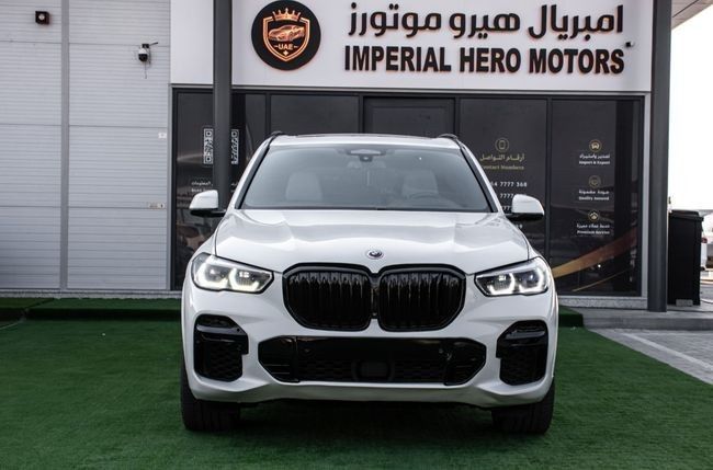 مستعملة ⁦BMW X5 M50i IV (G05/G18)، 4.4 l، 2023⁩ في في الإمارات, عجمان من IMPERIAL HERO MOTORS، اللون أبيض. المواصفات الأمريكية | AUTO.AE | إعلان #285682