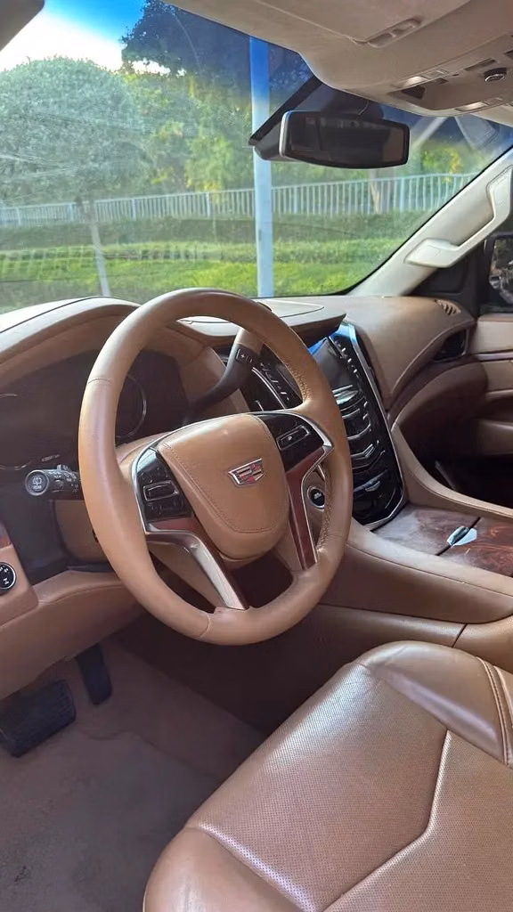 Used Cadillac Escalade IV, 6.2 l, 2016 in UAE, Ajman by Al Tarek Motors FZE, Golden color. GCC Specs | AUTO.AE | Listing #296572 — photo 9 of 10