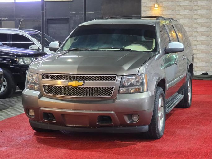 Подержанный Chevrolet Suburban XI, 5.3 л, 2014 в Аджмане от Abu Rashid Cars  Коричневый цвет. GCC | AUTO.AE