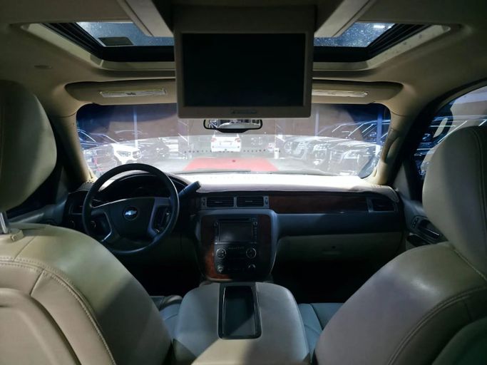 Подержанный Chevrolet Suburban XI, 5.3 л, 2014 в Аджмане от Abu Rashid Cars  Коричневый цвет. GCC | AUTO.AE