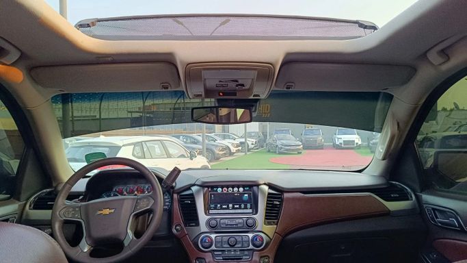 Подержанный Chevrolet Tahoe IV, 5.3 л, 2016 в Аджмане от Abu Rashid Cars  Золотистый цвет. GCC | AUTO.AE
