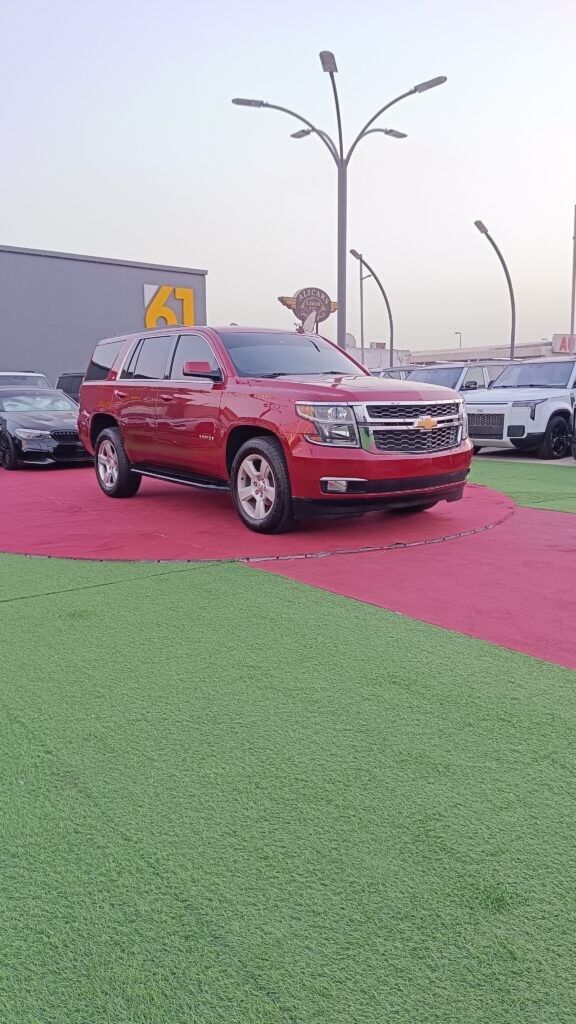 مستعملة Chevrolet Tahoe رابعاً, 5.3 l, 2015 في في عجمان من DEAL CARS، اللون أحمر. المواصفات الكندية | AUTO.AE
