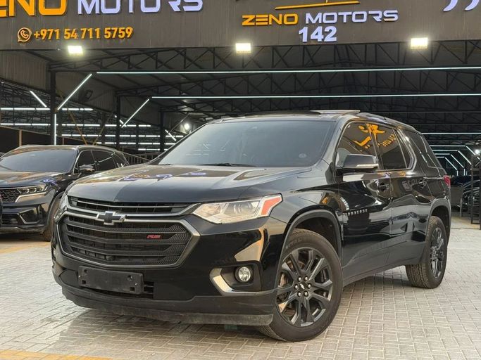 Подержанный Chevrolet Traverse II, 3.6 л, 2020 в Аджмане от Zeno Motors Fze Черный цвет. Корейская | AUTO.AE
