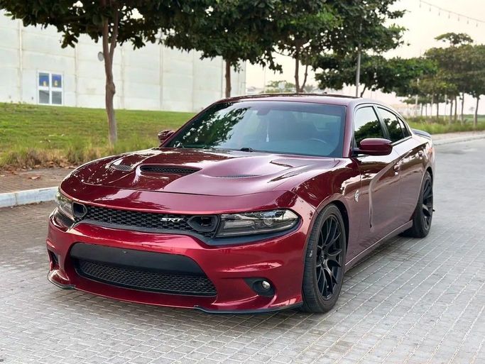 Подержанный Dodge Charger R_T VII (LD) Рестайлинг, 5.7 л, 2018 в Аджмане от BLACK HORSE MOTORS Бордовый цвет. Американская | AUTO.AE