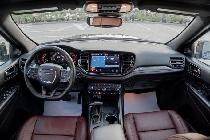 Подержанный Dodge Durango III Рестайлинг 2, 3.6 л, 2025 в Аджмане от AMG Cars Черный цвет. Американская | AUTO.AE