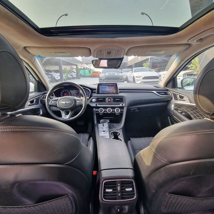 Подержанный Genesis G70 I Рестайлинг, 2.0 л, 2021 в Аджмане от Syria Motors Белый цвет. Канадская | AUTO.AE