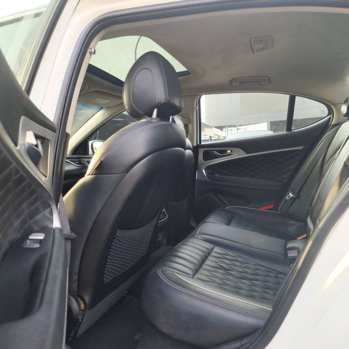 Подержанный Genesis G70 I Рестайлинг, 2.0 л, 2021 в Аджмане от Syria Motors Белый цвет. Канадская | AUTO.AE