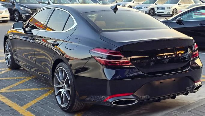 Подержанный Genesis G70 I Рестайлинг, 3.3 л, 2022 в Аджмане от Al Hilal Motors Черный цвет. Американская | AUTO.AE