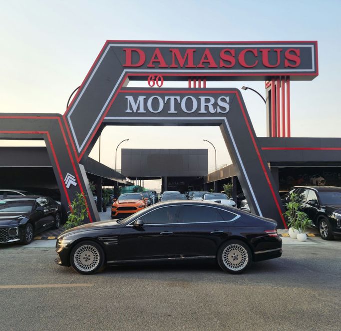 Подержанный Genesis G80 II, 2.5 л, 2021 в Аджмане от Syria Motors Черный цвет. Корейская | AUTO.AE