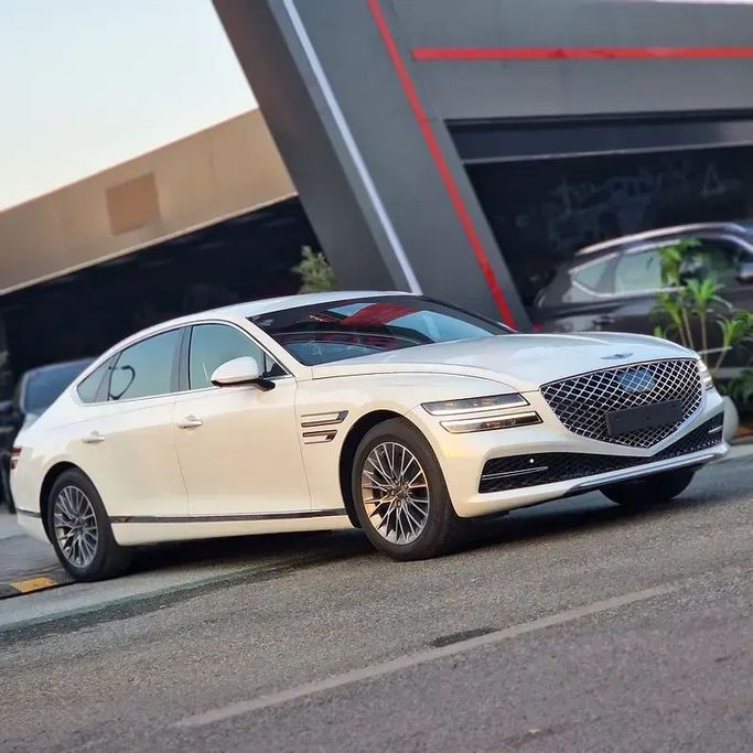 Used Genesis G80 II, 2.5 l, 2021 in Ajman by Damascus Motors , White color. Korean Specs | AUTO.AE