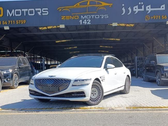 Подержанный Genesis G80 II, 2.5 л, 2023 в Аджмане от Zeno Motors Fze Белый цвет. Корейская | AUTO.AE