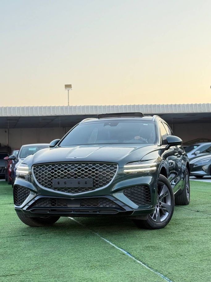 Подержанный Genesis GV70 I, 2.5 л, 2023 в Аджмане от Syria Motors Зеленый цвет. Корейская | AUTO.AE