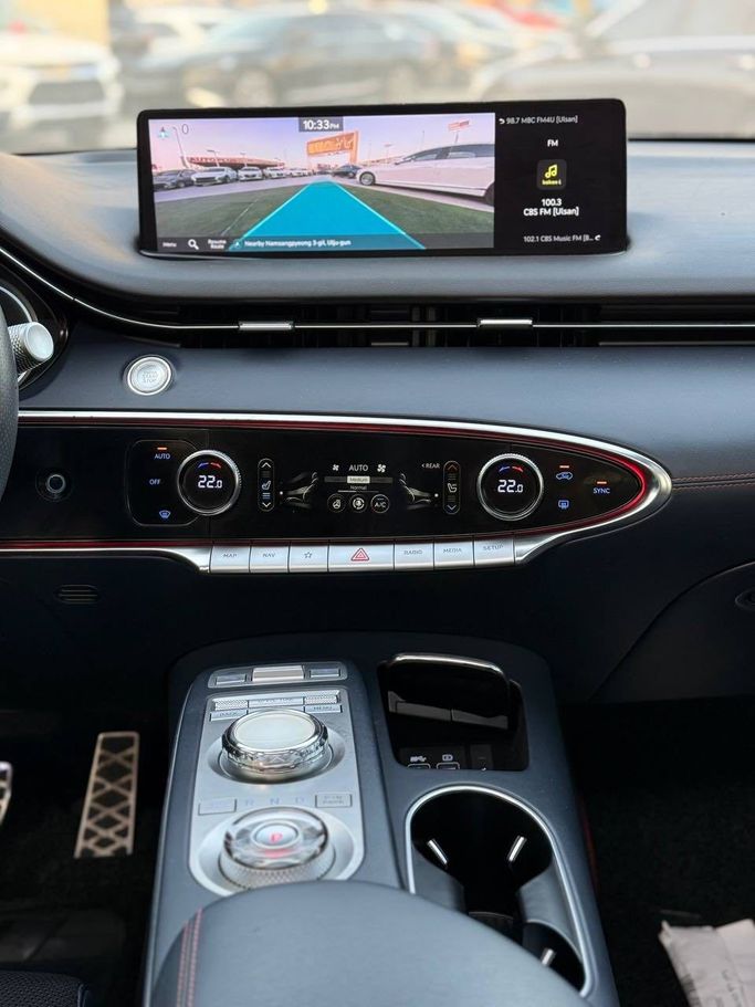 Подержанный Genesis GV70 I, 2.5 л, 2023 в Аджмане от Syria Motors Зеленый цвет. Корейская | AUTO.AE