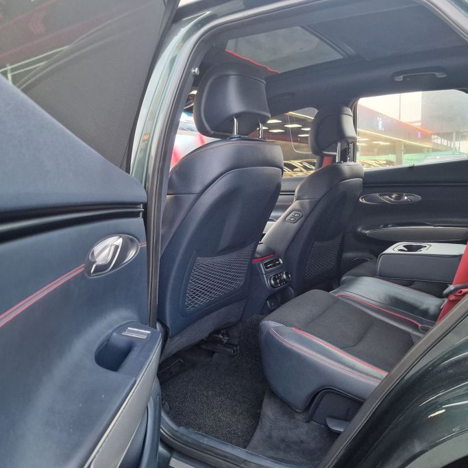 Подержанный Genesis GV70 I, 2.5 л, 2023 в Аджмане от Syria Motors Зеленый цвет. Корейская | AUTO.AE