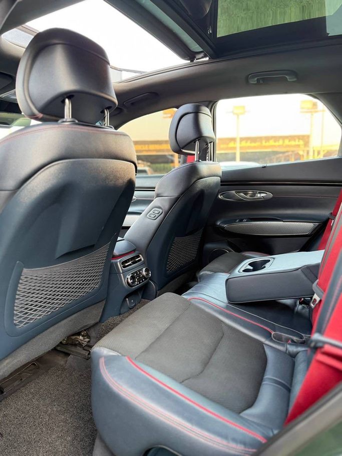 Подержанный Genesis GV70 I, 2.5 л, 2023 в Аджмане от Syria Motors Зеленый цвет. Корейская | AUTO.AE