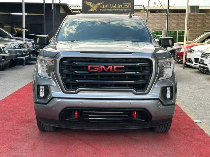 Подержанный GMC Sierra IV, 5.3 л, 2022 в Аджмане от Al Jernas Used Cars Trading FZE Серый цвет. GCC | AUTO.AE
