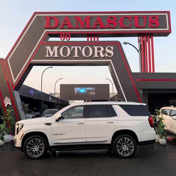 Подержанный GMC Yukon XL V Рестайлинг, 6.2 л, 2025 в Аджмане от Syria Motors Белый цвет. Американская | AUTO.AE