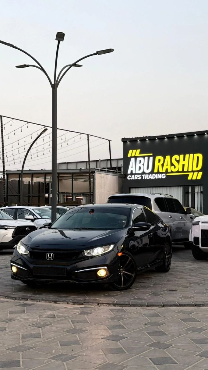 Used Honda Civic X, 2.0 l, 2019 in Ajman by Abu Rashid Cars , Black color. American Specs | AUTO.AE