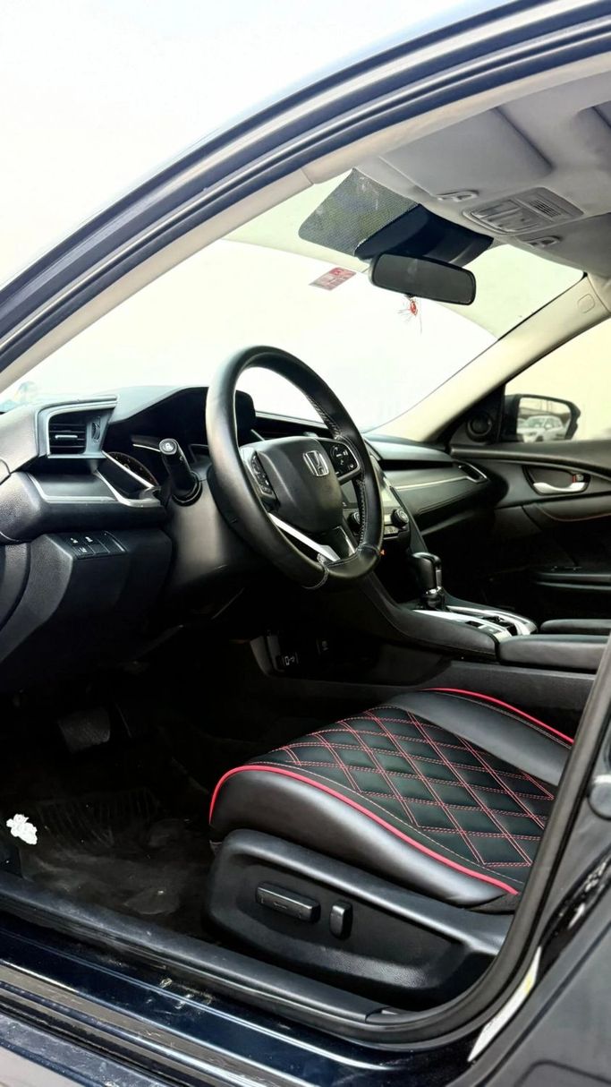 Used Honda Civic X, 2.0 l, 2019 in Ajman by Abu Rashid Cars , Black color. American Specs | AUTO.AE