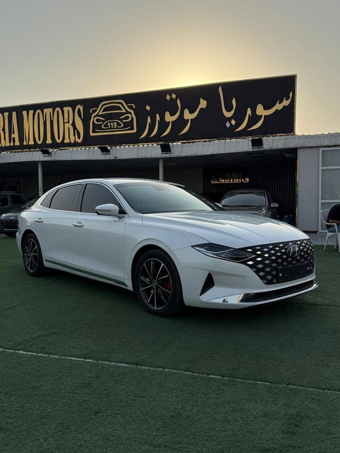 Подержанный Hyundai Azera III Рестайлинг, 3.5 л, 2020 в Аджмане от Syria Motors Белый цвет. Корейская | AUTO.AE