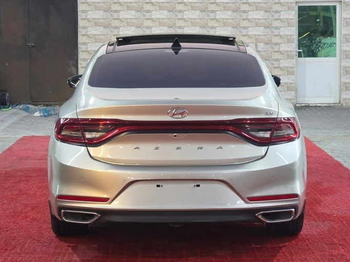 Подержанный Hyundai Azera III, 3.5 л, 2018 в Аджмане от Abu Rashid Cars  Золотистый цвет. GCC | AUTO.AE