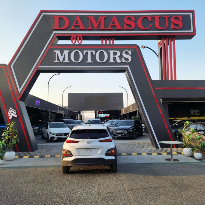 Подержанный Hyundai Kona I, 1.6 л, 2020 в Аджмане от Syria Motors Белый цвет. Корейская | AUTO.AE