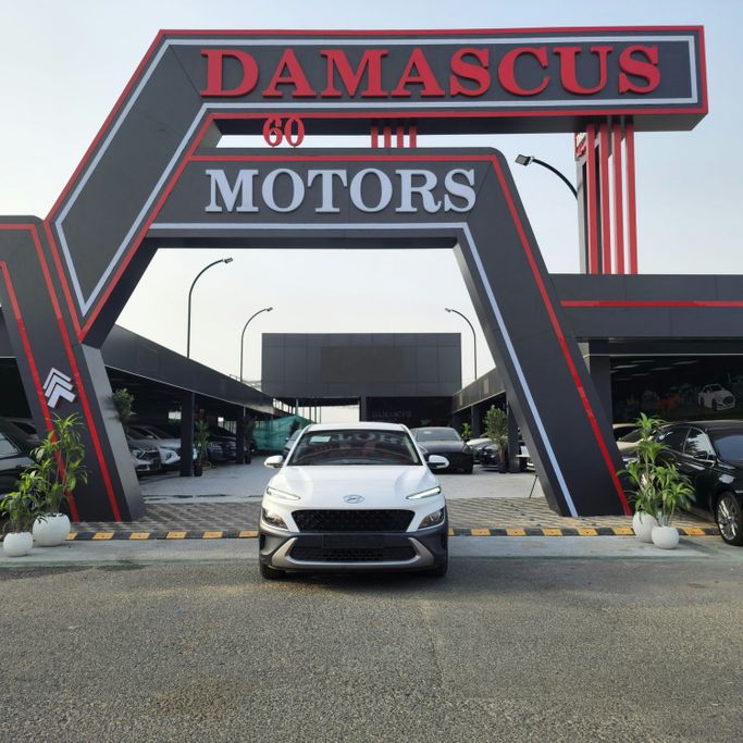 Подержанный Hyundai Kona I Рестайлинг, 1.6 л, 2022 в Аджмане от Syria Motors Белый цвет. Корейская | AUTO.AE