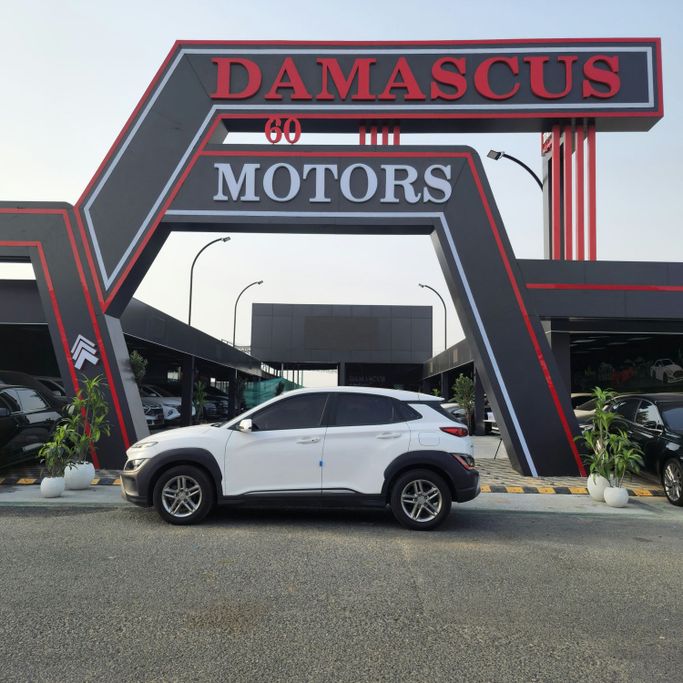 Подержанный Hyundai Kona I Рестайлинг, 1.6 л, 2022 в Аджмане от Syria Motors Белый цвет. Корейская | AUTO.AE