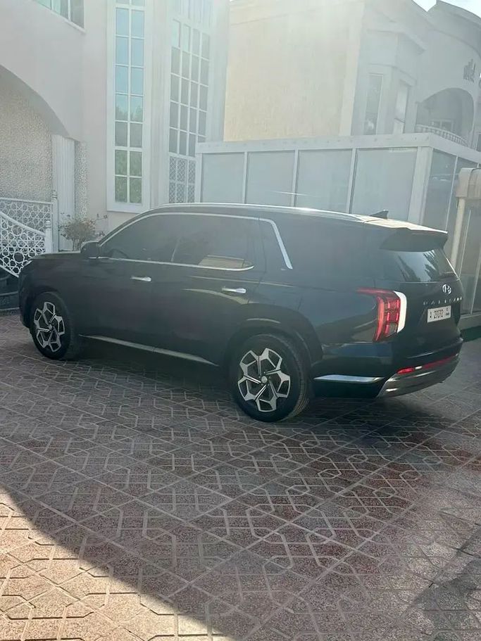 Подержанный Hyundai Palisade I, 3.8 л, 2022 в Аджмане от Al Hilal Motors Синий цвет. Американская | AUTO.AE