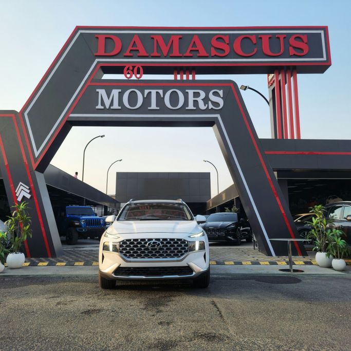 Подержанный Hyundai Santa Fe IV Рестайлинг, 2.2 л, 2023 в Аджмане от Syria Motors Белый цвет. Корейская | AUTO.AE