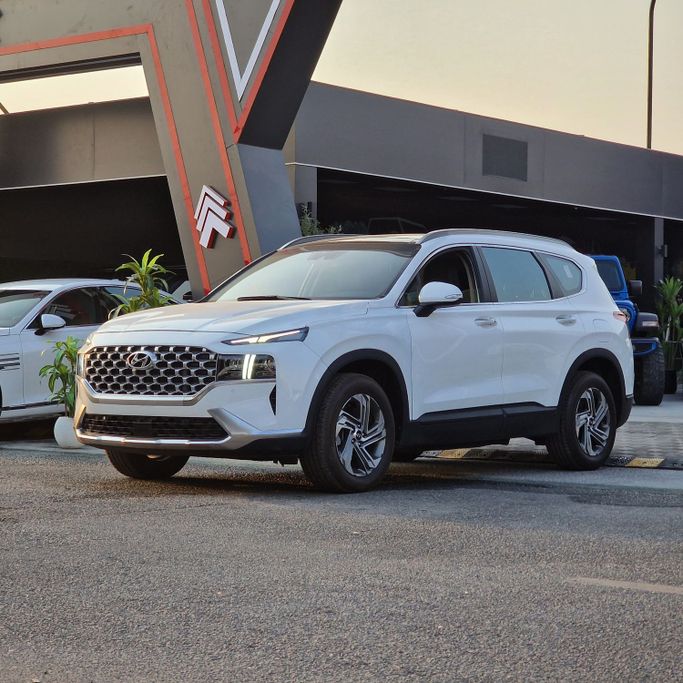 Подержанный Hyundai Santa Fe IV Рестайлинг, 2.2 л, 2023 в Аджмане от Syria Motors Белый цвет. Корейская | AUTO.AE