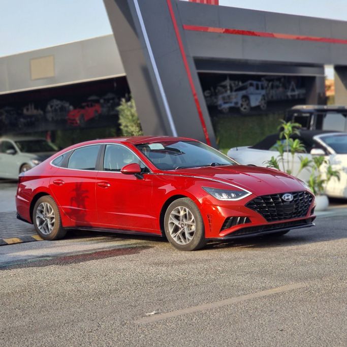Подержанный Hyundai Sonata VIII (DN8), 2.5 л, 2020 в Аджмане от Syria Motors Красный цвет. Американская | AUTO.AE