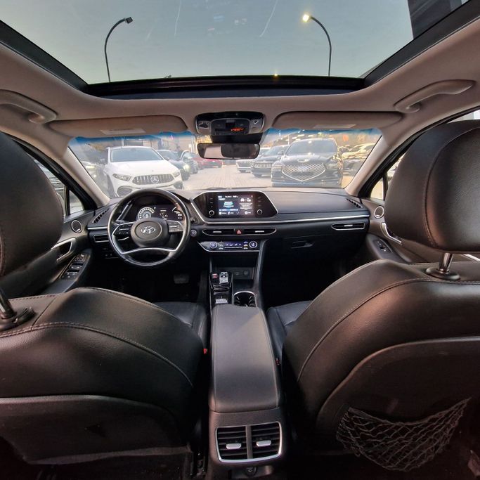 Подержанный Hyundai Sonata VIII (DN8), 2.5 л, 2020 в Аджмане от Syria Motors Черный цвет. Американская | AUTO.AE