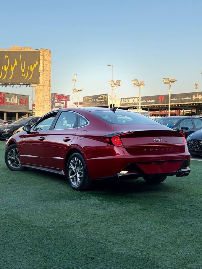 Подержанный Hyundai Sonata VIII (DN8), 2.5 л, 2020 в Аджмане от Syria Motors Красный цвет. Американская | AUTO.AE