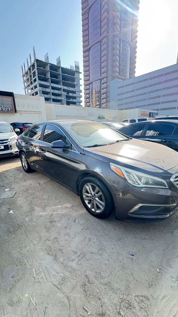 Used Hyundai Sonata VII (LF), 2.4 l, 2017 in Ajman, Brown color. American Specs | AUTO.AE