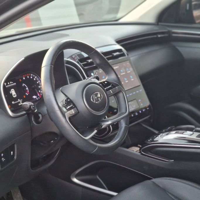 Подержанный Hyundai Tucson IV, 1.6 л, 2022 в Аджмане от Syria Motors Серый цвет. Корейская | AUTO.AE