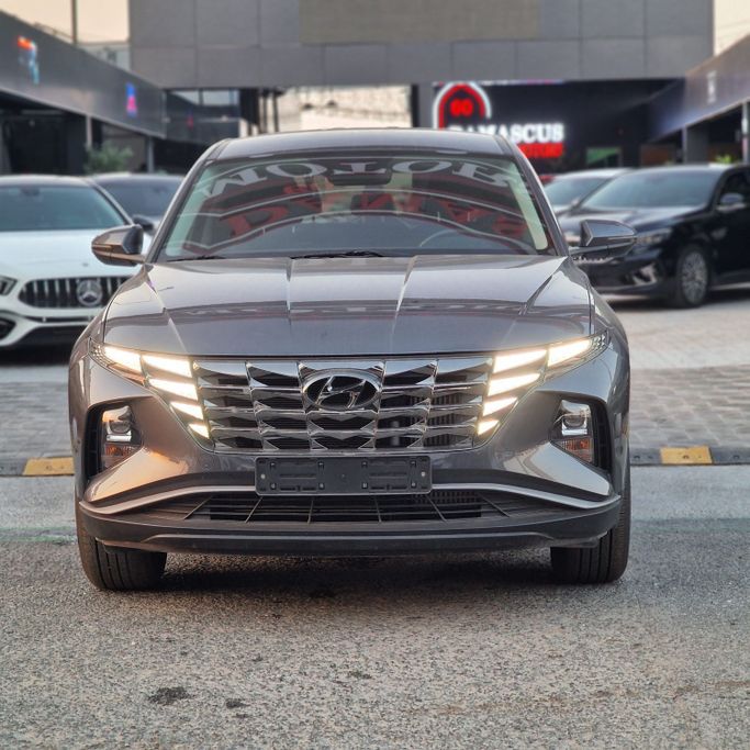Подержанный Hyundai Tucson IV, 1.6 л, 2022 в Аджмане от Syria Motors Серый цвет. Корейская | AUTO.AE