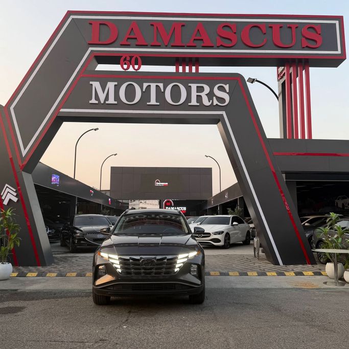 Подержанный Hyundai Tucson IV, 2.5 л, 2023 в Аджмане от Syria Motors Серый цвет. Американская | AUTO.AE