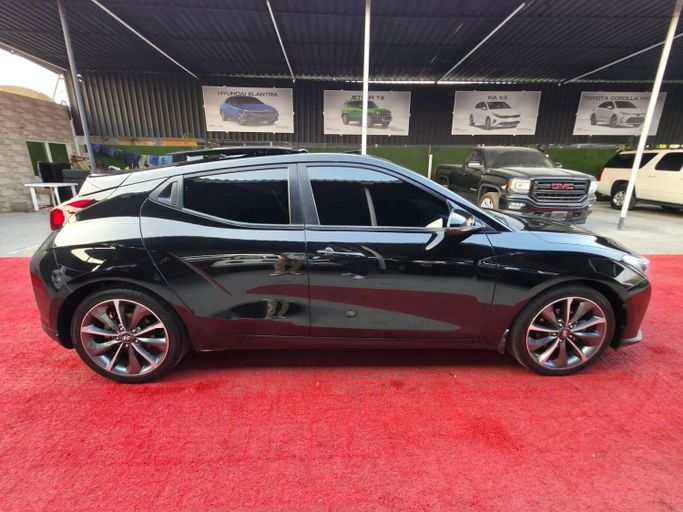 Подержанный Hyundai Veloster II, 2.0 л, 2019 в Аджмане от Abu Rashid Cars  Черный цвет. GCC | AUTO.AE