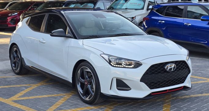 Подержанный Hyundai Veloster II, 1.6 л, 2019 в Аджмане от Al Hilal Motors Белый цвет. Американская | AUTO.AE | Объявление #261245