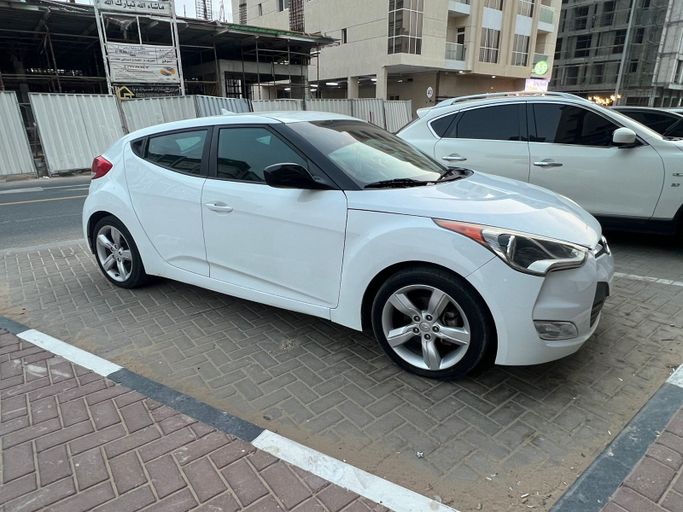 Подержанный Hyundai Veloster I Рестайлинг, 1.6 л, 2015 в Аджмане Белый цвет. Американская | AUTO.AE | Объявление #267226
