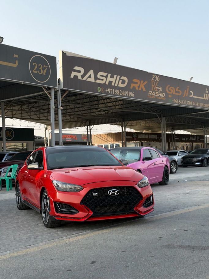 مستعملة ⁦Hyundai Veloster ثانياً، 1.6 l، 2019⁩ في في الإمارات, عجمان من TOP MOTORS، اللون برتقالي. المواصفات الكندية | AUTO.AE | إعلان #289817