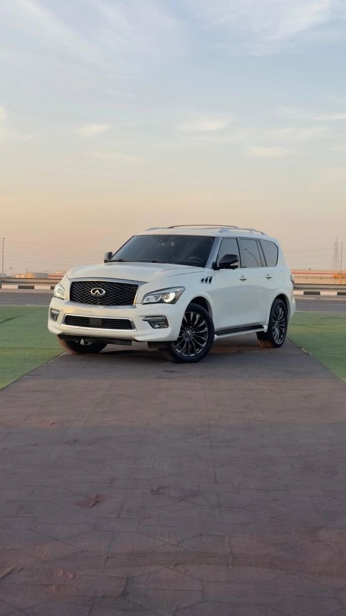 Подержанный Infiniti QX80 I Рестайлинг, 5.6 л, 2015 в Аджмане от Abu Rashid Cars  Белый цвет. Американская | AUTO.AE