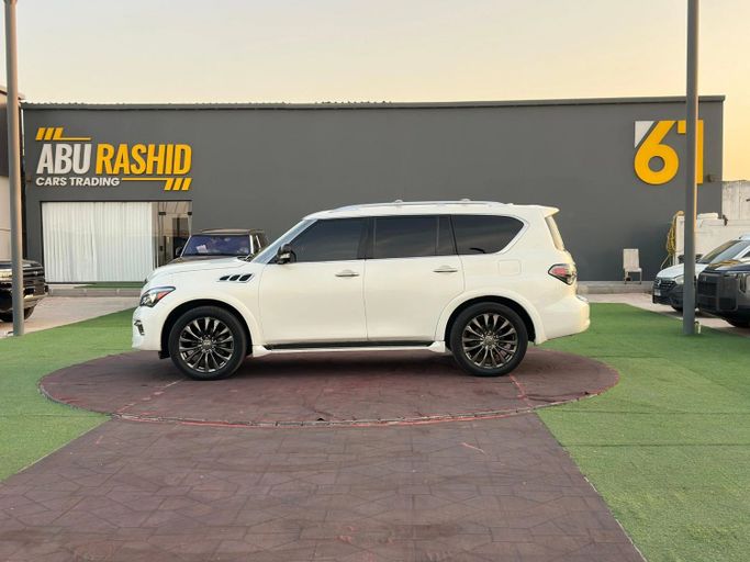 Подержанный Infiniti QX80 I Рестайлинг, 5.6 л, 2015 в Аджмане от Abu Rashid Cars  Белый цвет. Американская | AUTO.AE